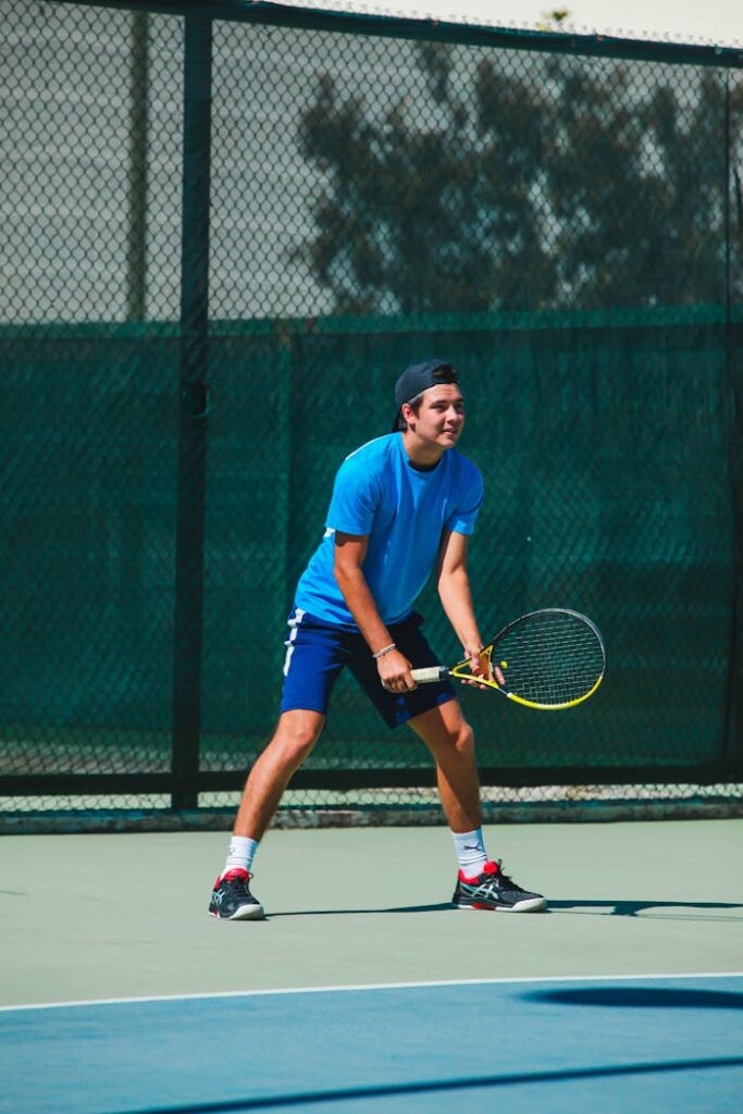 A Man Holding a Tennis Racket